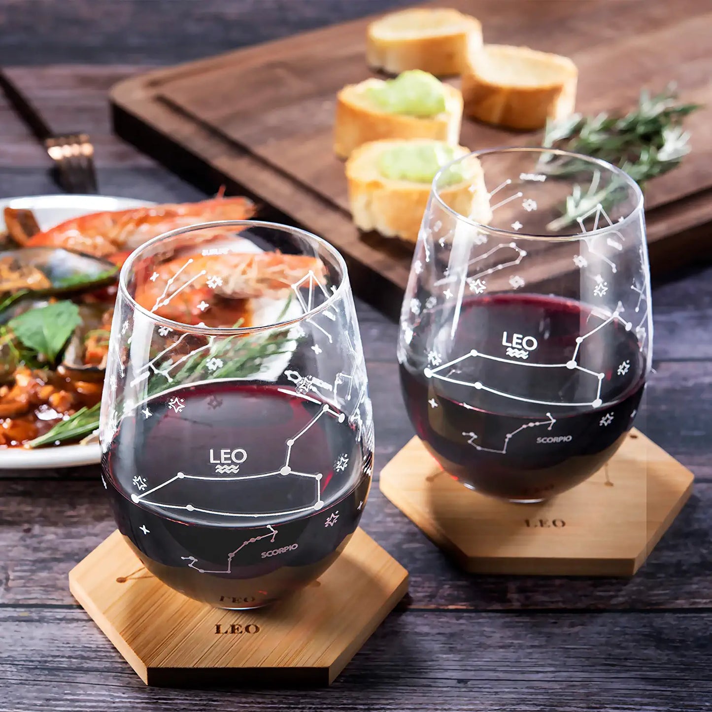 Set of 2 Zodiac Sign Wine Glasses with 2 Wooden Coasters by The Wine Savant - Astrology Drinking Glass Set with Etched Constellation Tumblers for Juice, Water Home Bar Horoscope Gifts 18oz (Leo)-1