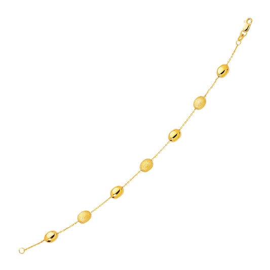14k Yellow Gold Bracelet with Textured and Polished Pebble Stations-0